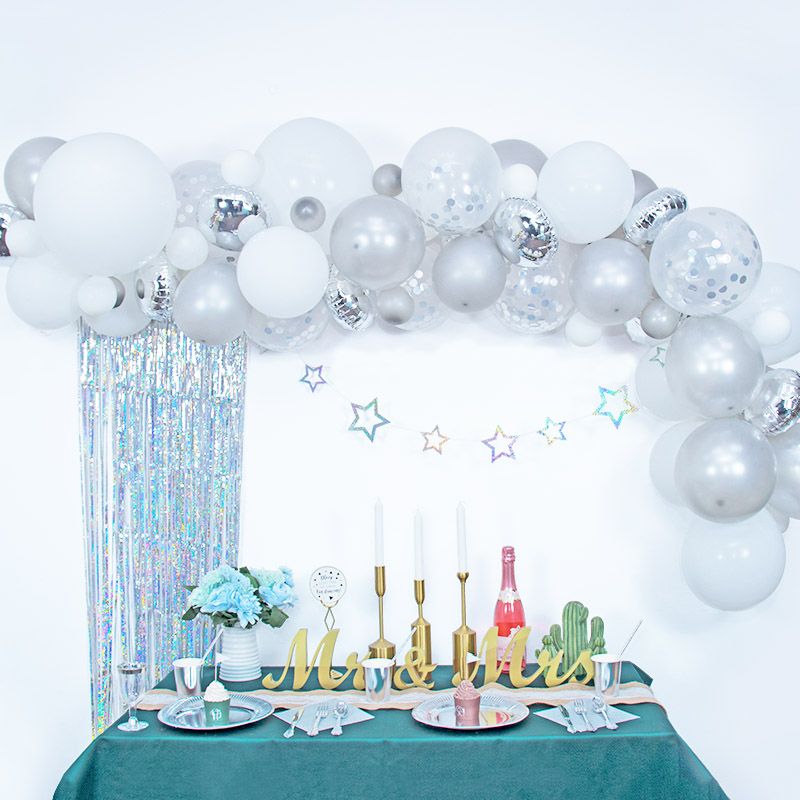 Beautiful silver and white coloured DIY balloon garland kit - example of set up 