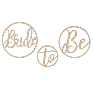 wooden hoops that say "bride to be" 